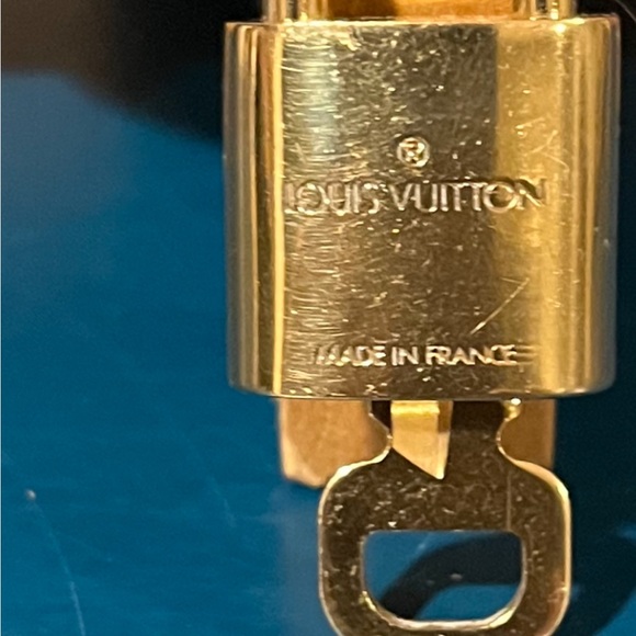 Louis Vuitton Lock and Key Authentic LV